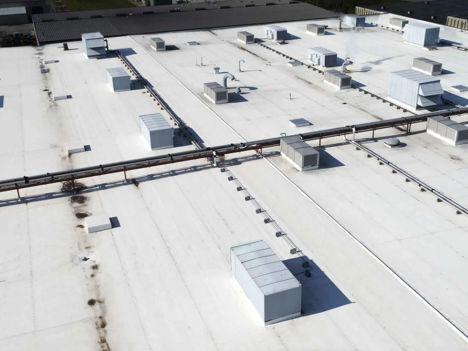 Aerial view of a repaired industrial complex's roof