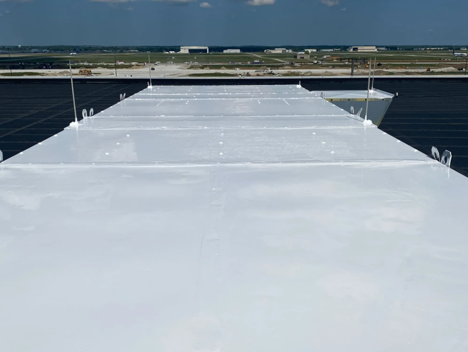 Aerial view of a repaired commercial facility's roof