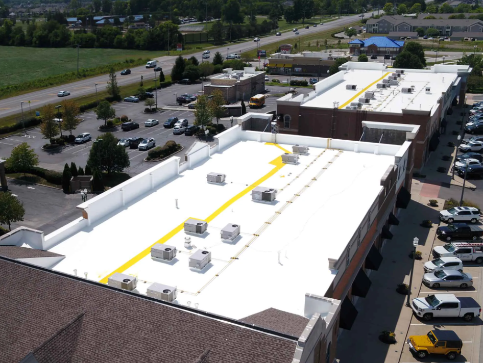Aerial view of a retail store's roof recently coated