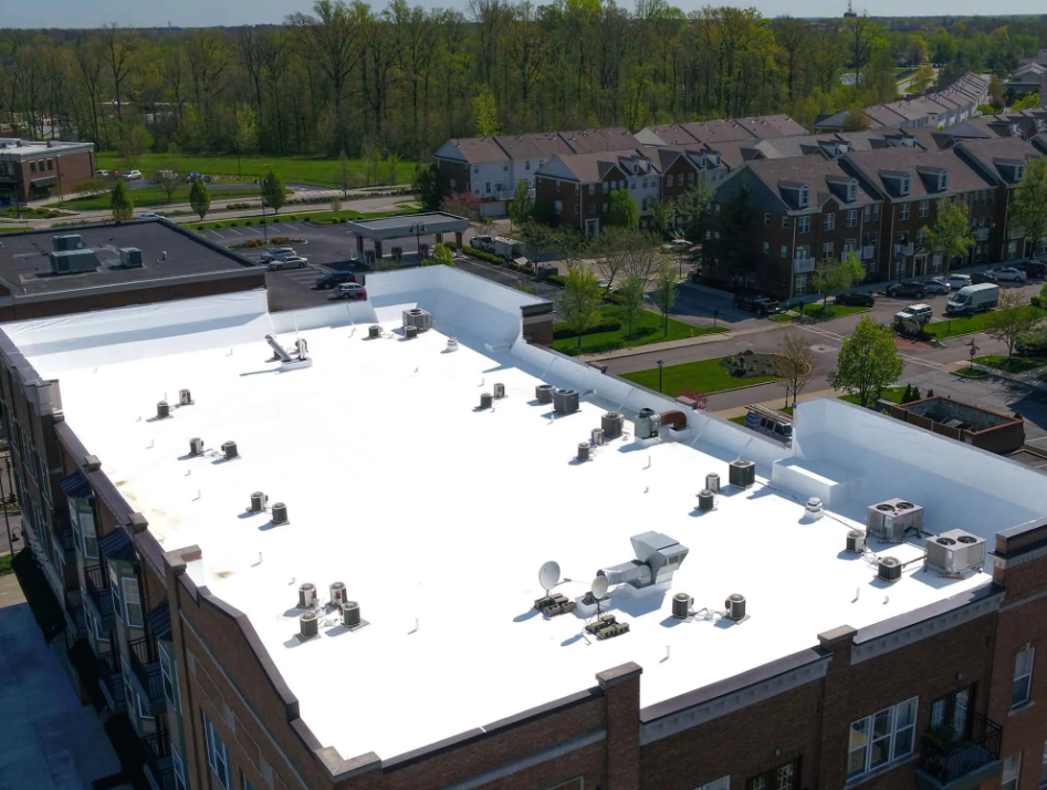 Aerial view of a retail store's completed roof restoration